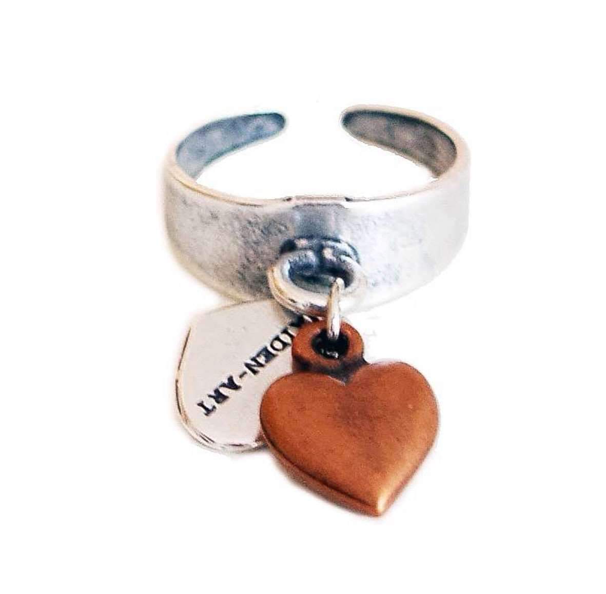 Statement ring in silver with copper heart charm